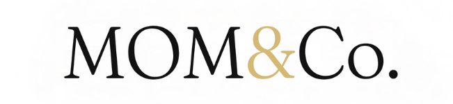 Mom & Co. logo with black text and gold ampersand on white background